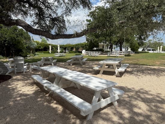 Signor Vineyards picnic table under the trees.